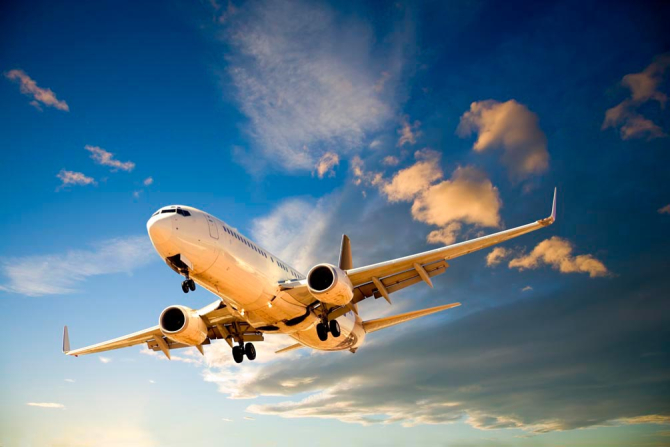 Фотошпалери Літак в хмарах